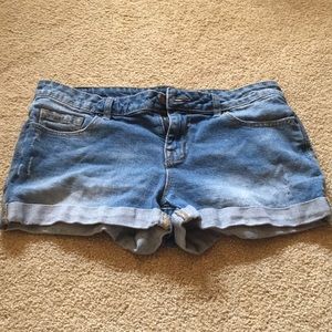 Mid Rise Medium Wash Jean Shorts